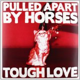 PULLED APART BY HORSES